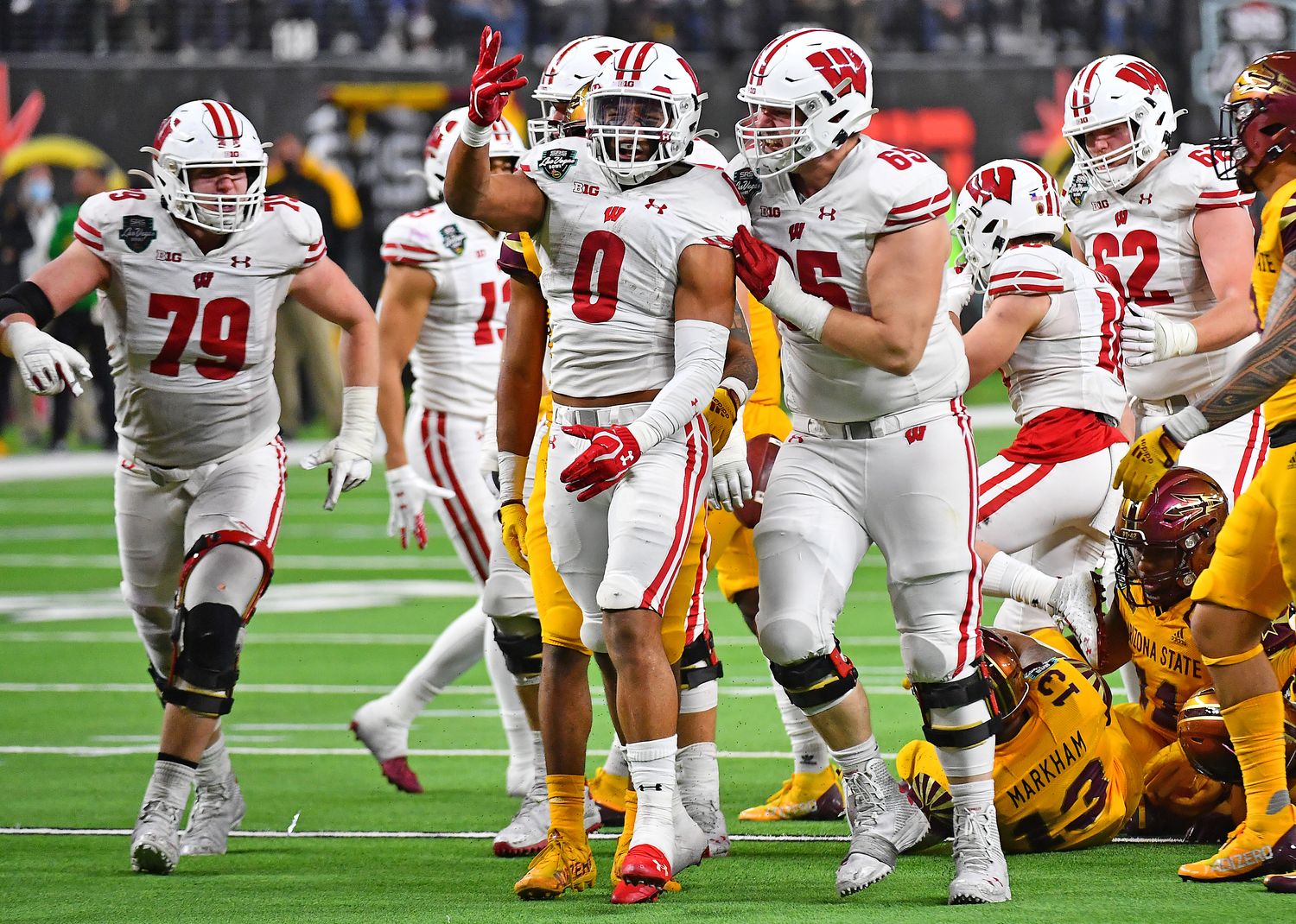 Running back Braelon Allen celebrates a first down run against Arizona State in the Las Vegas Bowl (Credit: Stephen R. Sylvanie-USA TODAY Sports)